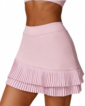 Falda de tenis con bajo festoneado, talle alto y corte en A.