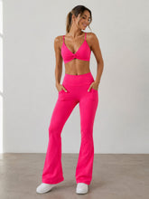 2 Piece Set. Suit Yourself Twist Front Sports Bra With Flared Wide Leg Pants Leggings